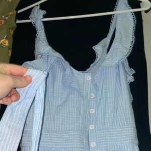 White and blue stripped long romper/jumpsuit. Never worn!!